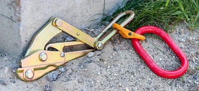 Team NCT service line puller kit oval link and cable grab set on the ground at a jobsite