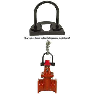 NCT valve setter with 2-piece design shown close up and holding a valve