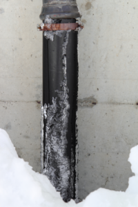 A snowy pipe in winter