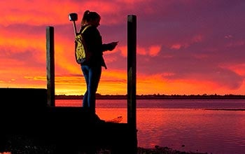 Woman using Trimble GIS