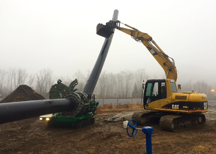 Excavator with HDPE Pipe